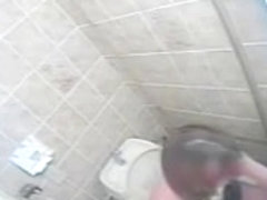Spy camera in toilet voyeurs girl rubbing hairy cunt