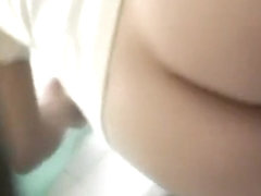 Close up shot of shaved pussy pissing