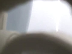 Porno of a Skinny white lady filmed taking a clear piss by spy cam