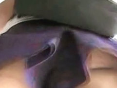 Attractive and perfect female ass in a purple skirt voyeur video