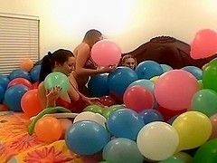 Three lesbains having sex with ballons