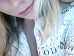 charming blonde plays with h...