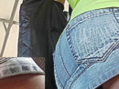 Chick in jean short show tattoo in candid upskirt video