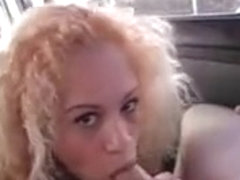 Curly blonde eats and rides shaft in the bus