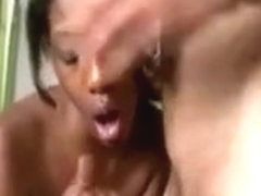 Busty Black Amateur Ebony Tugging On Cock