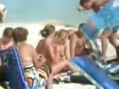 Nice young tits - beach voyeur video