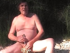 man outdoors sounding urethral dildo 178