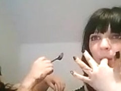 Two brunette EMO babes have fun smearing