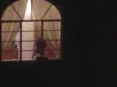 Hot milf neighbor flashing boobs in the window