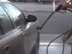 Hot blonde looker with big tits washes a car in the nude