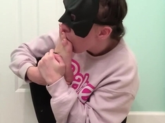 Batgirl Licks Own Feet