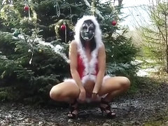 Exhibitionist woman in sexy Christmas outfit