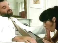 Bearded doctor being sucked by nurse