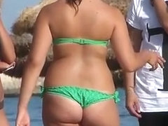 Girl in green bikini with sexy ass
