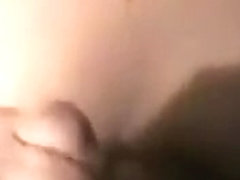Sucking her boyfriend's shlong in her bedroom on camera