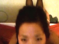 Cute asian girl blows her white bf's cock and gets doggystyle fucked