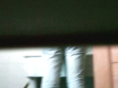 Peeing spy cam shot of a cute asian girl on a toilet