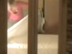 Two sexy roommates getting voyeured on cam through window