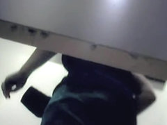 She loses down cloths and demonstrates ass in change room