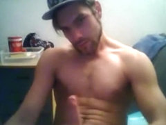 Gorgeous guys shows his ass and cums