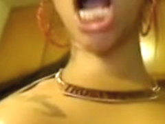 Big tits Latina plays on a webcam