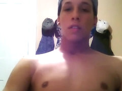 Mixed race cutie jerks his dick and foot teases