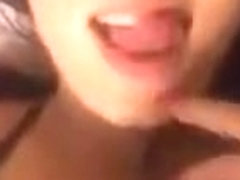 girl is playing with her huge boobs