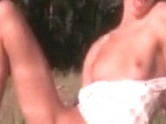 Teenage minx Natasha rubbing her craving twat outdoor