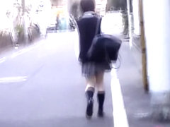 Cute Asian school-babe skirt sharked by a passerby.