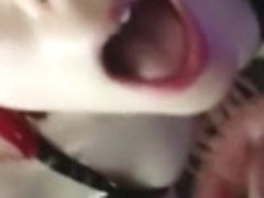 Sexy redhead gags on a big cumshot