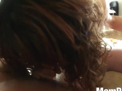 MILF sucking two cocks