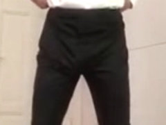 Cock playing Tranny in tight leather suit and pantyhose