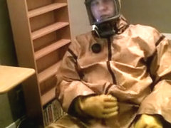 Cumming in a vintage rubber hazmat costume