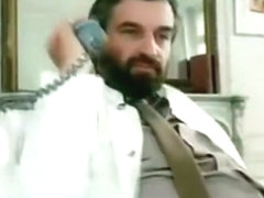 Bearded doctor being sucked by nurse
