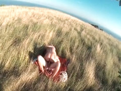 Blonde MILF is ridden by a big dick on a field