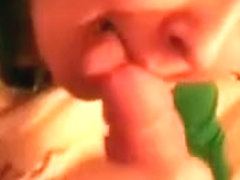 Slutty brunette babe giving head