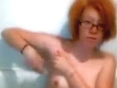 Redhead Nerd Shaving In The Bathtub