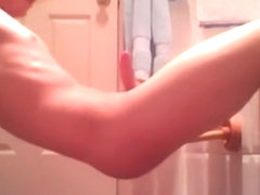 Marvellous blonde boy playing sextoy in bathroom