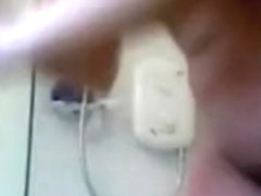 Spying on a golden-haired PAWG taking a shower