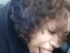 Curly-haired brunette neighbour enjoys sucking my cock in a car
