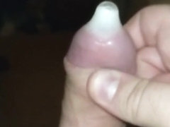 Close up slow motion condom cum