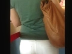 Ass - Cute Girl In White Tight Jeans waiting at Mc Donald
