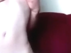 Homemade sex video on red couch