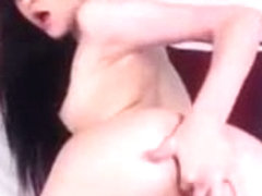 Petite slut fingers her ass