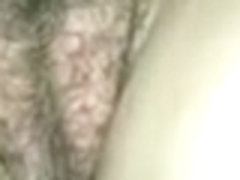 This amateur pov sex tape shows me playing with the beautiful vagina of my honey, while she is lyi.