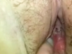 This girl close up fingers her pussy