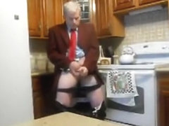 Daddy jacking in the kitchen in costume and tie