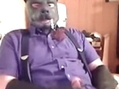 Office wolf enjoys a pipe and jacks-off