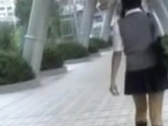 Pig-tailed oriental schoolgirl getting nicely spanked during sharking affair