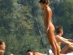 Hidden cam beach scenes featuring the amateur nudists